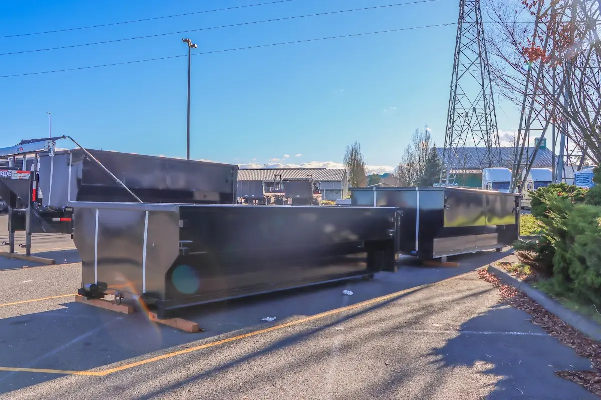 Roll-off dumpster ready for waste disposal at job site for Construction Dumpster Rental in Middle Smithfield